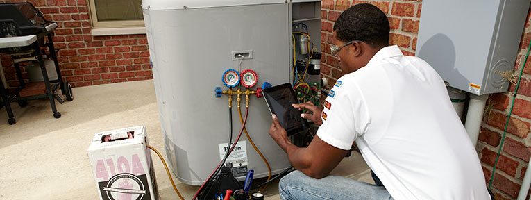 AC Heating Connect Service Tech uses an iPad 6 for important HVAC information