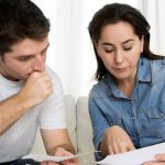 Homeowners look at their HVAC costs and electricity bills.